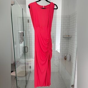 Free People fuschia open back ruched dress. Frint slit. Cap sleeve.